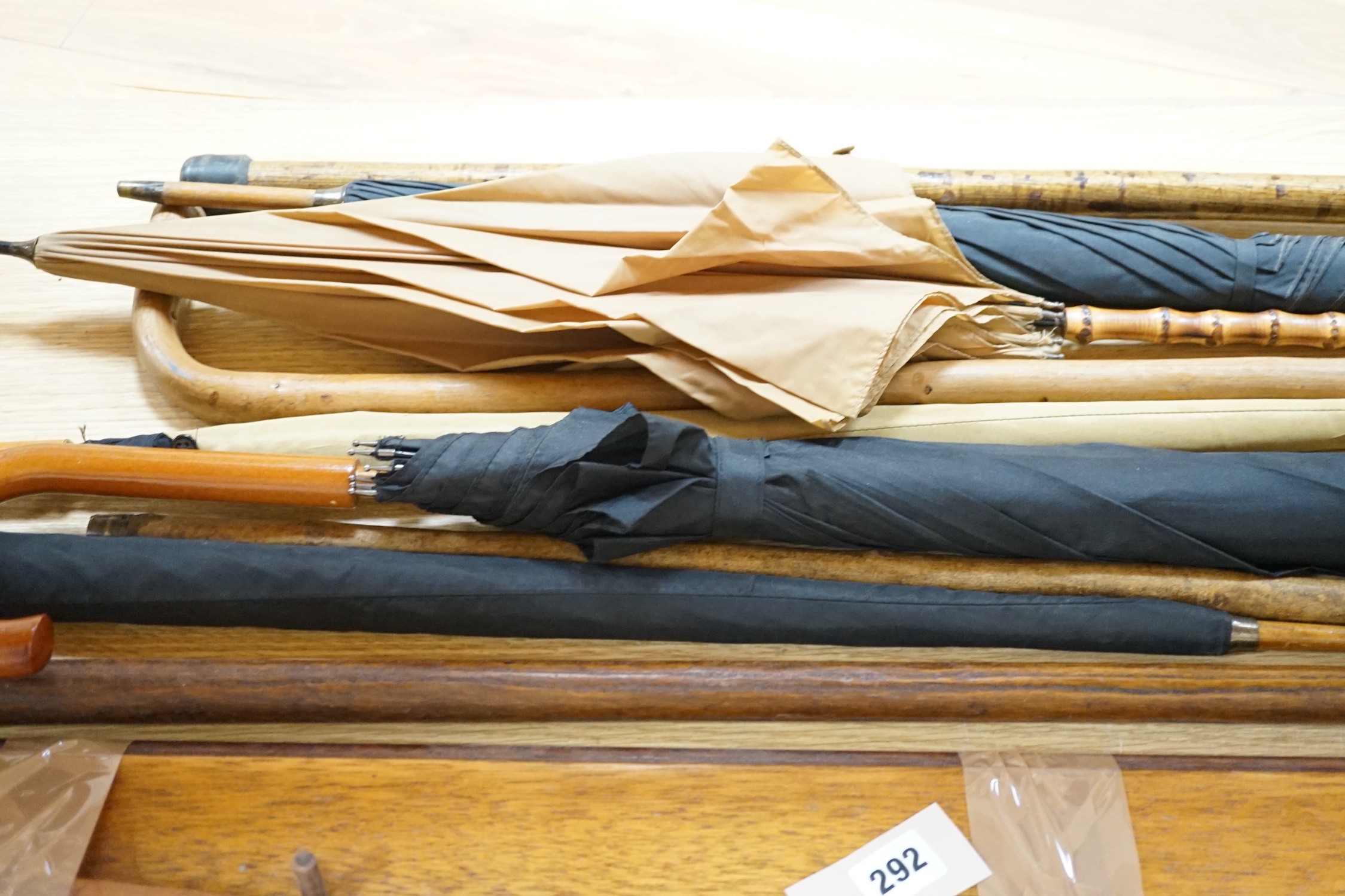 Four umbrellas and four walking sticks